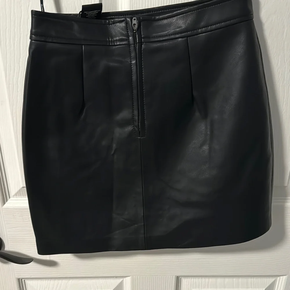 Black Asymmetrical Cut Out Mini Skirt - Picture 3 of 3